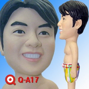 Q-A17-草裙舞男孩公仔 